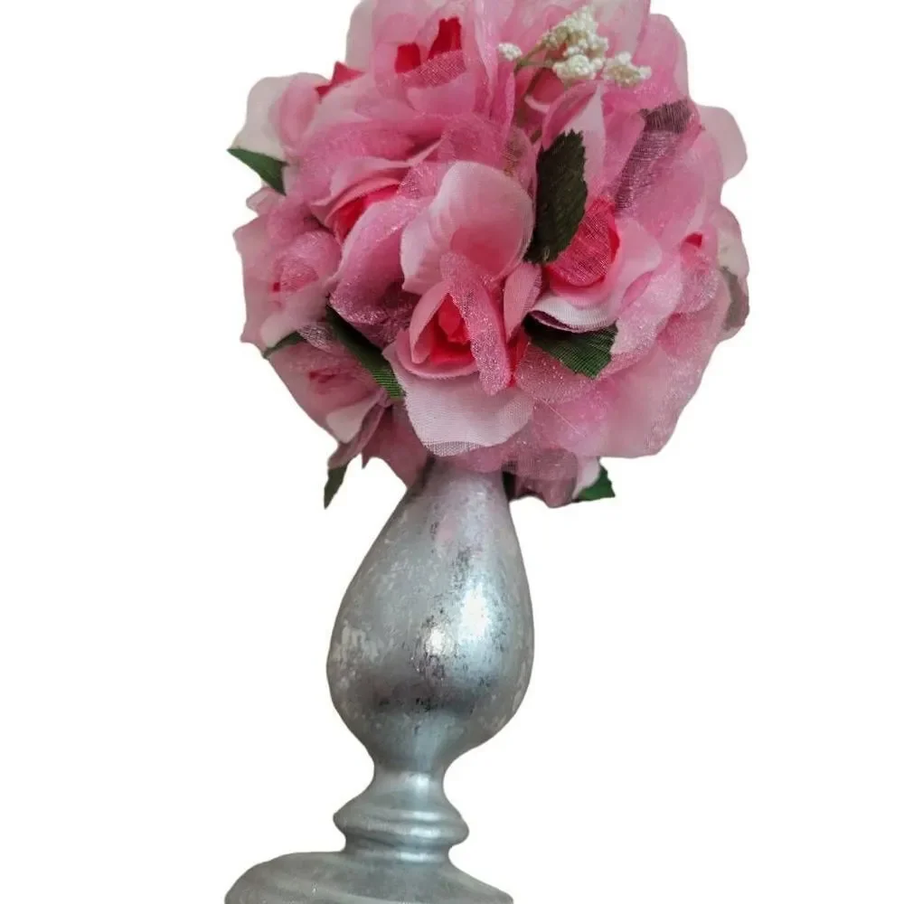 Pink floral arrangement in silver vase 8